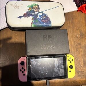 Nintendo Switch with Pink/Yellow Joy-Cons, 128GB SD Card + Zelda Carrying Case